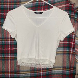 This is a white laced SHEIN top, newly bought, great condition